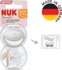Product packaging with a clear view of the product inside, along with marketing text and symbols. Náhľad obrázku produktu