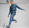 A man is playing football in a studio setting. Náhled obrázku produktu