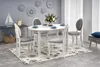 A dining room scene with a table and chairs. Náhľad obrázku produktu