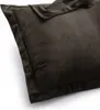 A close-up view of a dark brown pillowcase. Produktbild-Vorschau