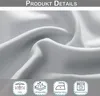 Close-up of a gray-white fabric with icons and text indicating product features. Produktbild-Vorschau