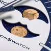 A close-up view of a watch face with moon phase indicators. Produktbild-Vorschau