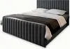 A gray upholstered bed with white pillows and a dark throw blanket, shown against a white background. Produktbild-Vorschau