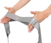 Hands holding a gray Theraband CLX fitness band. Produktbild-Vorschau
