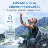 A man is drinking from a water bottle while hiking in a mountainous landscape. Anteprima dell’immagine prodotto