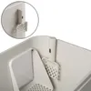 A close-up view of a cat litter box, showing a scoop attached to the side. Voir les images du produit