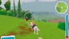 A video game scene of two people riding horses on a grassy hill. Anteprima dell’immagine prodotto