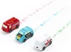 Three toy vehicles (fire truck, police car, ambulance) are lined up diagonally on a white background, each leaving a trail of small, colored icons behind them. Náhled obrázku produktu