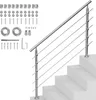 A stainless steel stair railing kit with various mounting hardware components laid out on a white background, with a partial view of the railing installed on concrete stairs. Podgląd zdjęcia produktu