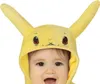A close-up of a baby wearing a yellow Pikachu costume hood. Voir les images du produit