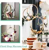A collage of floral hoop macrame crafts, with a larger scene showing decorated cakes and hanging hoops. Produktbild-Vorschau