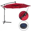A red cantilever umbrella with LED lights and a solar panel, shown with close-up insets of the light switch and solar panel. Voir les images du produit