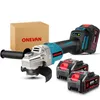 A cordless angle grinder with two batteries and a charger, displayed with a cardboard box in the background. Voir les images du produit