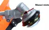 A close-up view of the gearbox and cutting head of a string trimmer, with an arrow pointing to a grease fitting. Produktbild-Vorschau