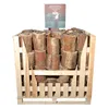 A wooden crate filled with logs, with a sign on top. Produktbild-Vorschau