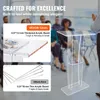 A group of people are in the background, blurred, while a clear acrylic podium is in the foreground. Text overlays highlight product features. Náhľad obrázku produktu