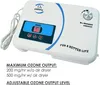 A white ozone generator with a blue trim and digital display. Náhled obrázku produktu