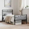A bedroom scene featuring a black metal bed frame. Podgląd zdjęcia produktu