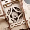 A close-up view of intricate wooden gears within a 3D puzzle. Produktbild-Vorschau