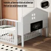 A white wooden children's bed with a house-shaped headboard featuring a chalkboard. Produktbild-Vorschau