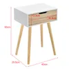 A white and wood bedside table with dimensions indicated by red lines and text. Náhled obrázku produktu