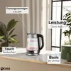 A kettle on a marble countertop with plants and window in the background. Náhľad obrázku produktu