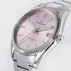 Close-up of a women's wristwatch with a pink dial and silver metal band. Náhled obrázku produktu