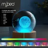 A glowing crystal ball with a planet engraving on a wooden base, with a color spectrum bar and smaller color samples below. Voir les images du produit
