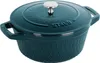 A teal Staub cocotte pot with a lid, shown from a slightly elevated side angle on a white background. Náhled obrázku produktu