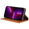 A brown leather flip case for an iPhone 13 Pro is shown with the phone inside and the case open, propping the phone up. Produktbild-Vorschau