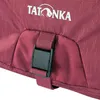 A close-up of a burgundy travel bag with a black buckle and strap. Produktbild-Vorschau