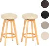 Two bar stools with cream-colored seats and light wooden legs are shown against a white background. To the right, there are swatches of different colors (dark brown, black, gray, and cream) that likely represent available seat colors. Náhled obrázku produktu