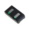A black battery holder with two silver batteries and green accents, shown on a white background. Produktbild-Vorschau