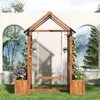 A wooden swing set with planters and flowers in a garden setting, with arched windows showing a forest landscape. Anteprima dell’immagine prodotto