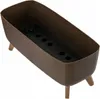 A brown planter with a black insert and wooden legs on a white background. Náhled obrázku produktu
