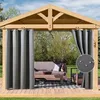 Outdoor curtains hanging in a wooden gazebo, with furniture visible inside. Náhled obrázku produktu