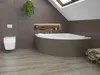 A modern bathroom with a corner bathtub, toilet, and a skylight. Produktbild-Vorschau