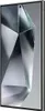 A close-up, angled view of a smartphone with a geometric, abstract wallpaper on its screen. Podgląd zdjęcia produktu