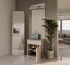 A tall, narrow entryway cabinet with a mirror and shoe storage, next to a large potted plant. Produktbild-Vorschau