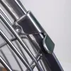 A close-up view of a metal clamp connecting two parts of a fan. Voir les images du produit