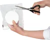 Hands are shown cutting open a sealed plastic package containing a round, white object, likely a refill for a dehumidifier. Anteprima dell’immagine prodotto