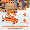 A scissor lift cart in a warehouse setting with boxes on shelves. Anteprima dell’immagine prodotto