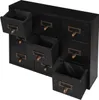 A black wooden cabinet with nine drawers, some of which are open, is displayed against a white background. Podgląd zdjęcia produktu
