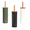 Three toilet brushes in different colors (green, black, white) with wooden handles and lids, displayed against a white background. Anteprima dell’immagine prodotto