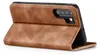 A brown flip cover case for a smartphone, shown from the back with the cover open. Produktbild-Vorschau