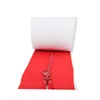 A red zipper is shown on a white background, with a white roll of material behind it. Produktbild-Vorschau