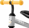 Close-up of the handlebars and front of a balance bike. Anteprima dell’immagine prodotto