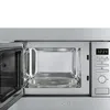 Close-up view of an open microwave oven. Produktbild-Vorschau
