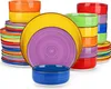 A collection of colorful ceramic plates and bowls stacked and arranged. Produktbild-Vorschau