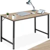 A desk with a laptop, mug, lamp, and notebook. Náhled obrázku produktu